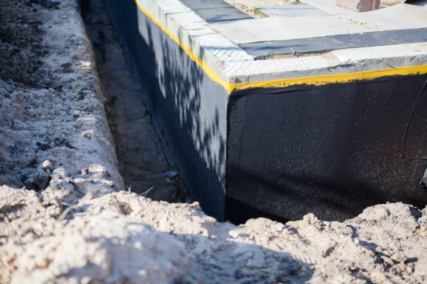 Professional Waterproofing technician working in Waterloo, WI